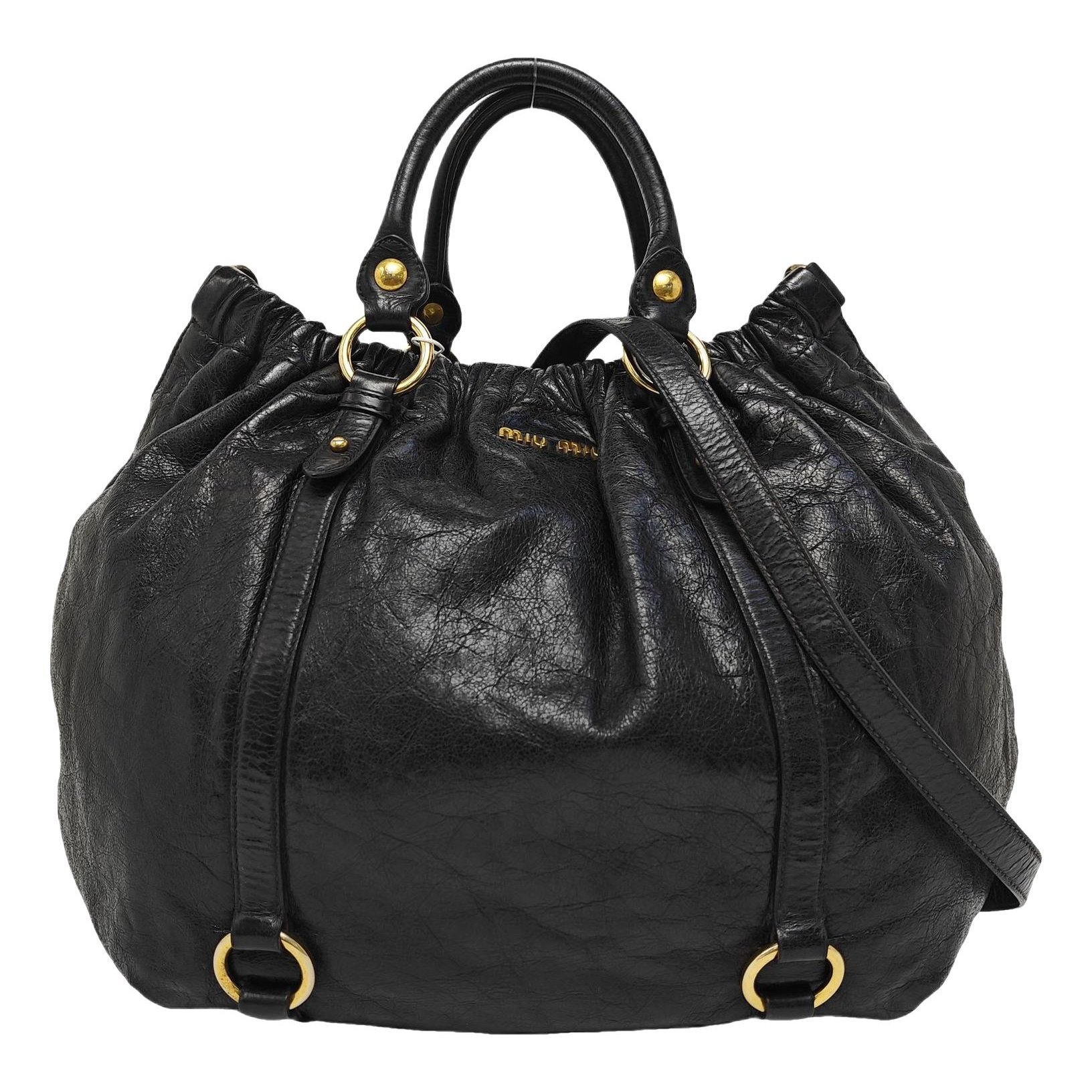 Bow bag leather handbag