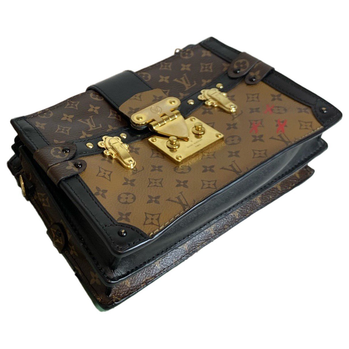 Pochette Trunk leather handbag