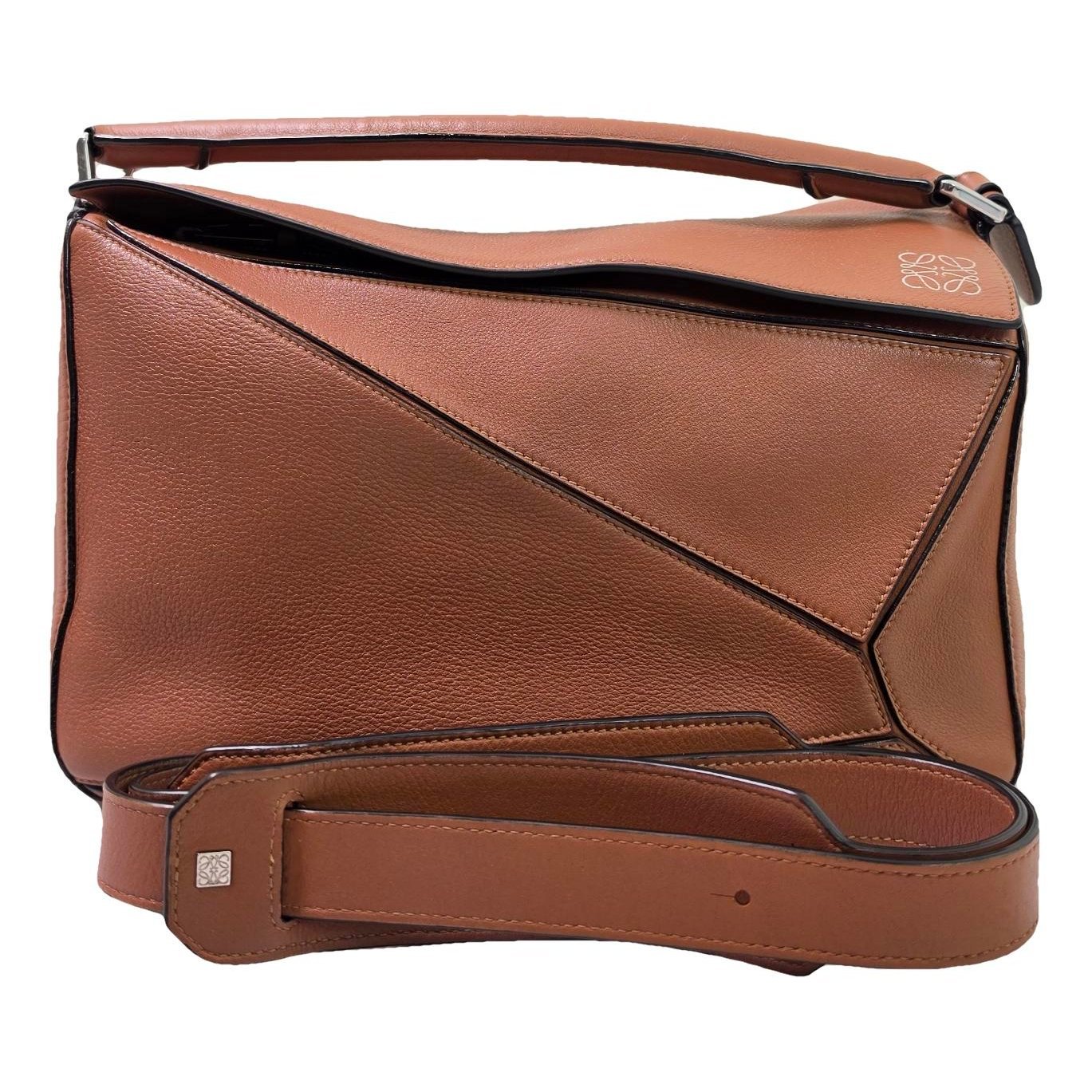 Puzzle leather handbag