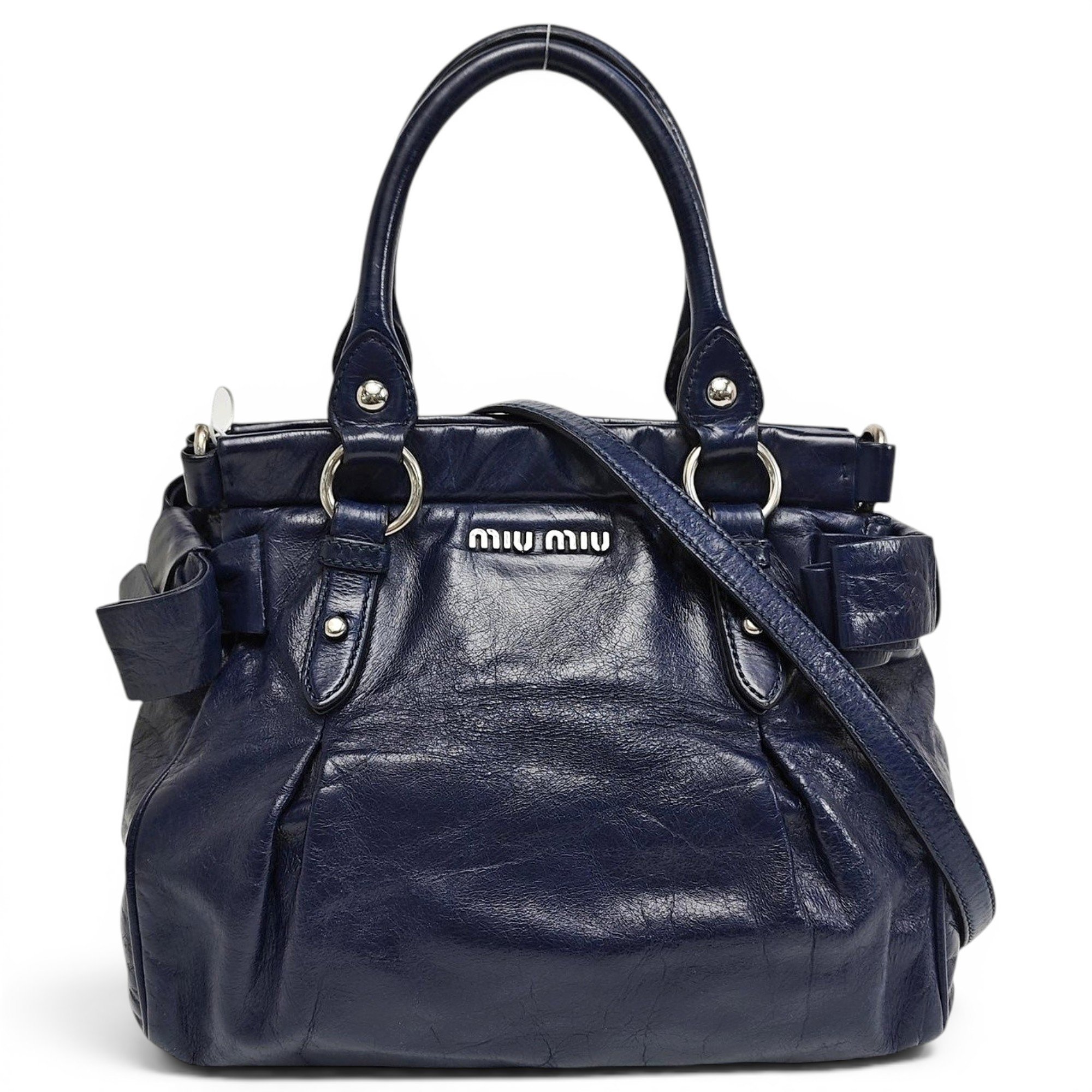 Bow bag leather handbag