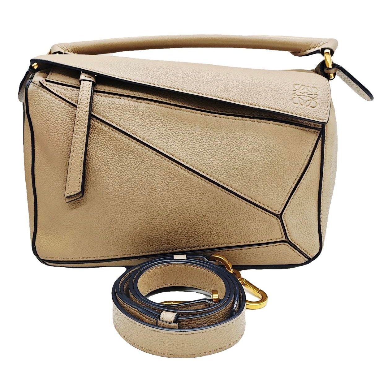 Puzzle leather handbag
