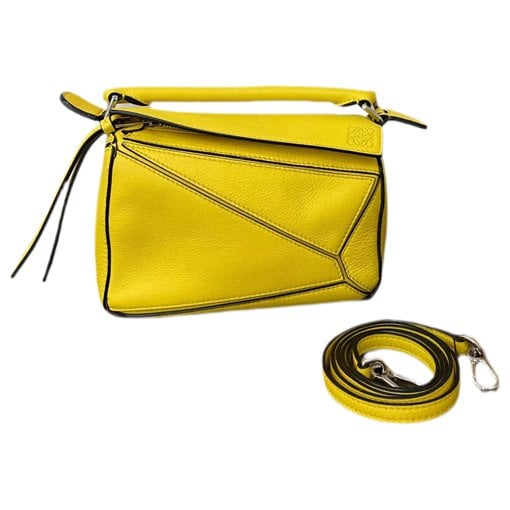 Puzzle leather handbag