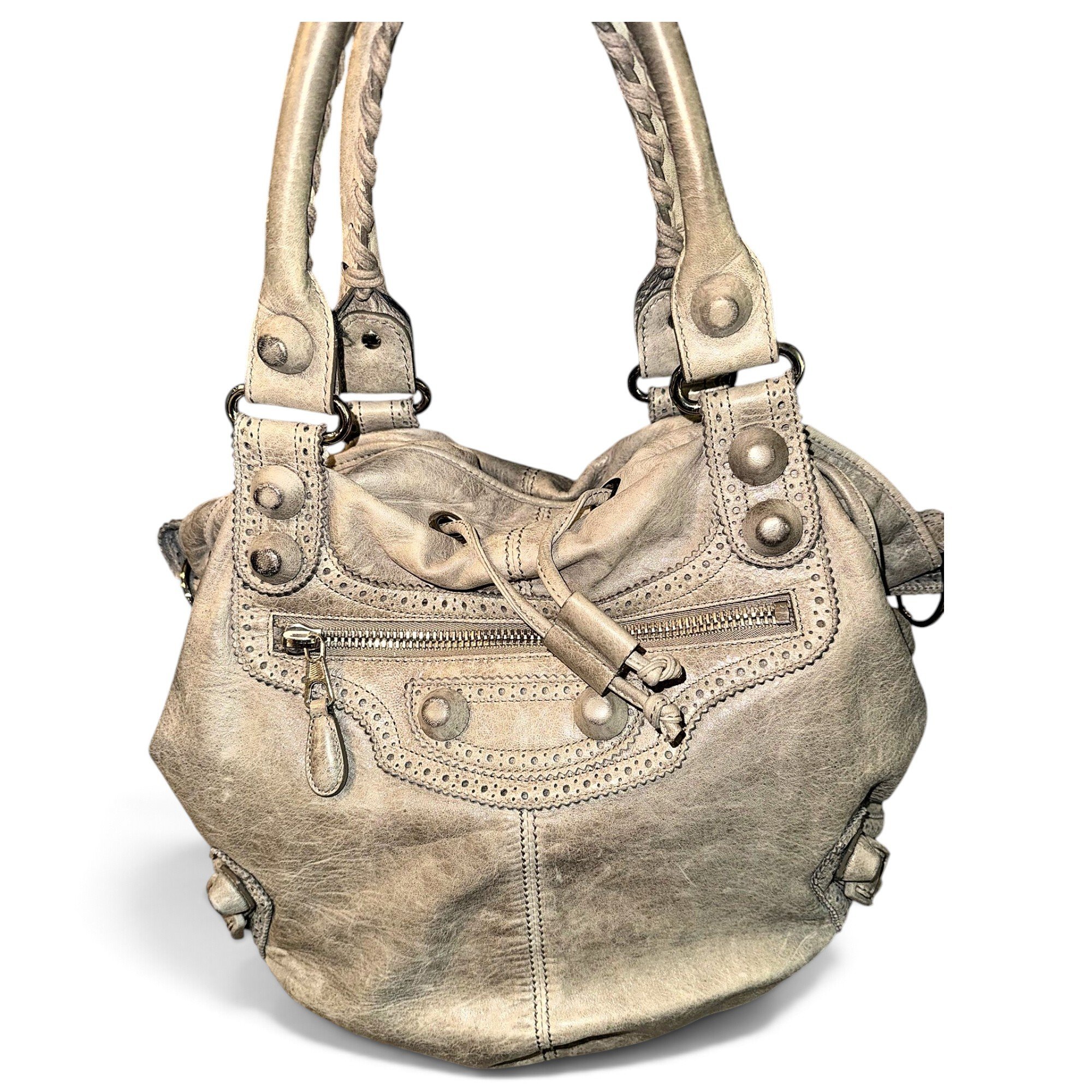 Pompon leather handbag