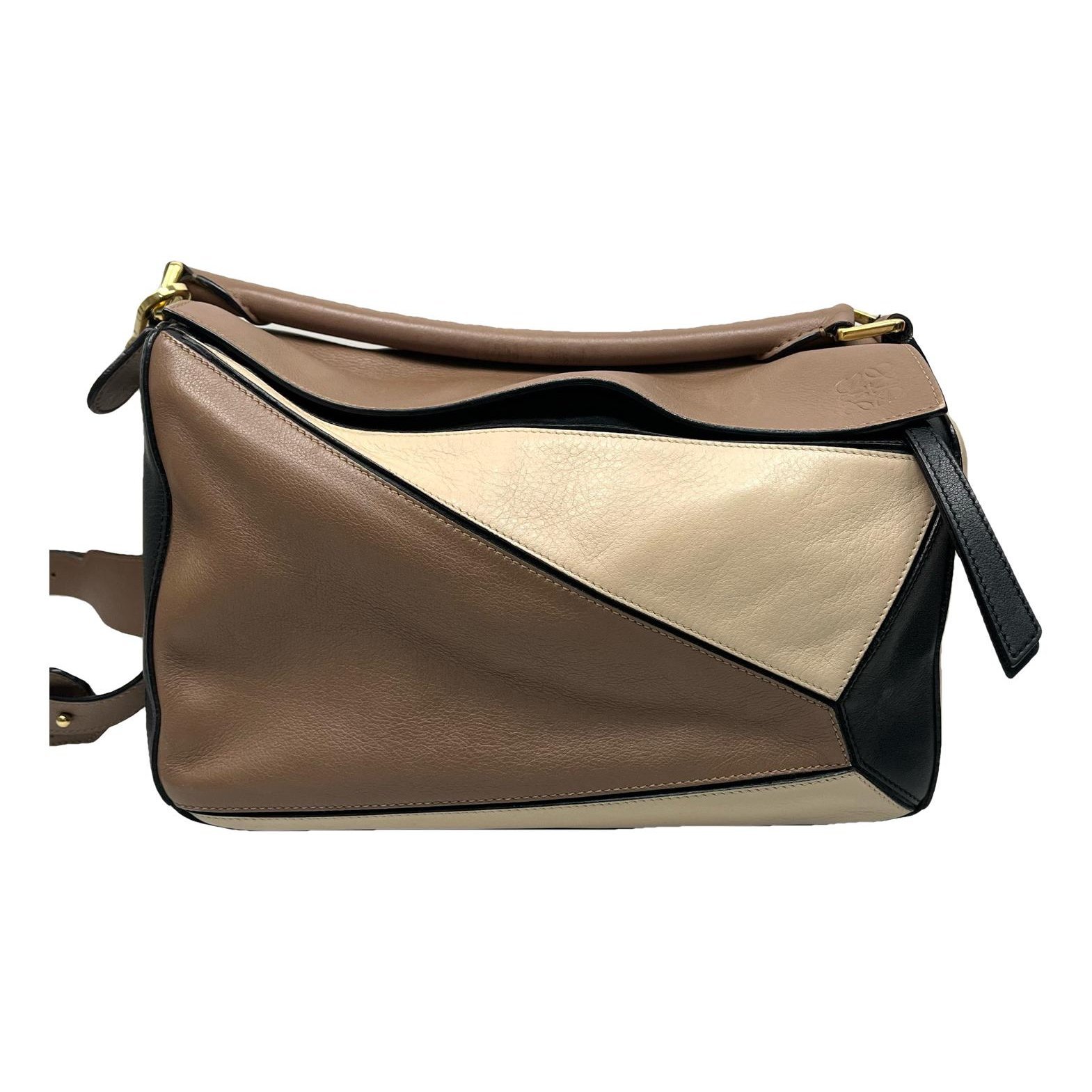 Puzzle leather handbag