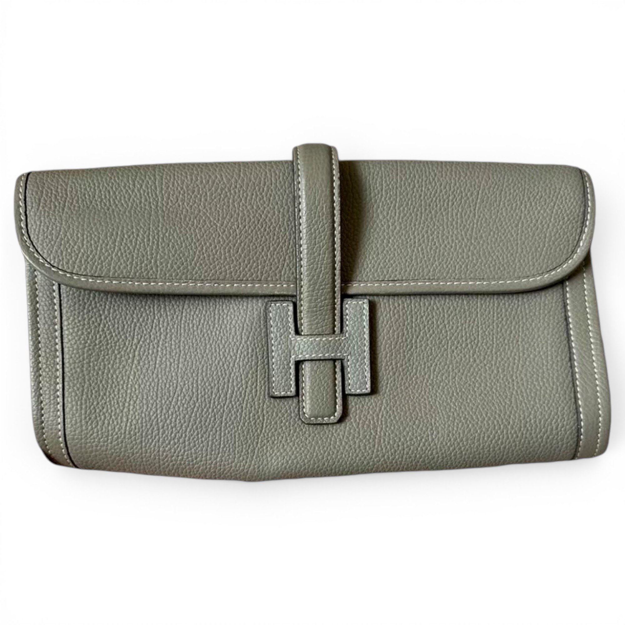 Jige leather clutch bag
