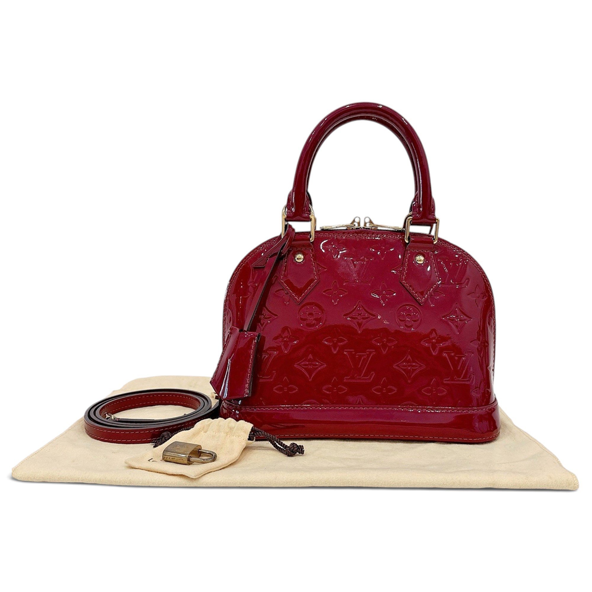 Louis Vuitton Alma BB patent leather handbag