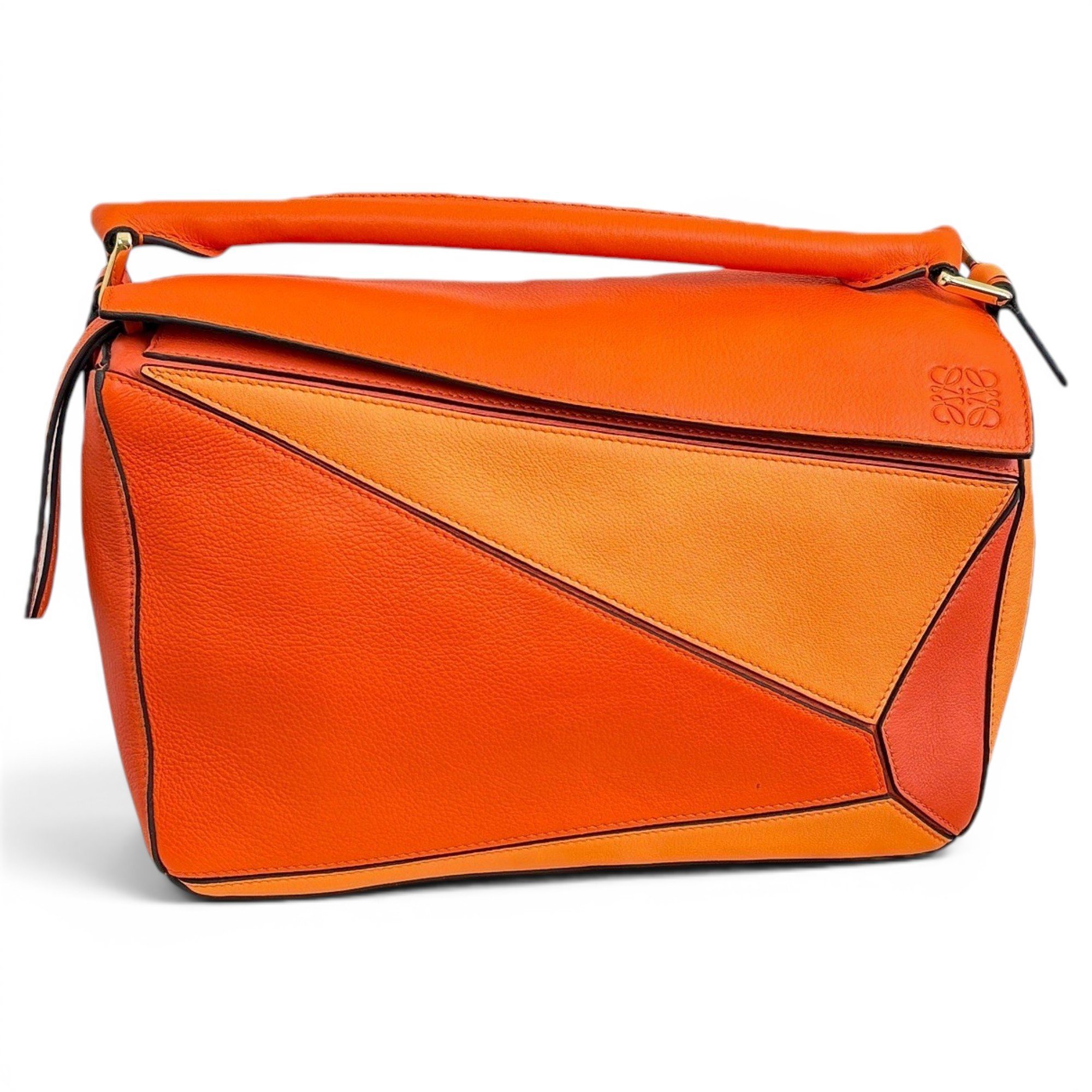 Puzzle leather handbag
