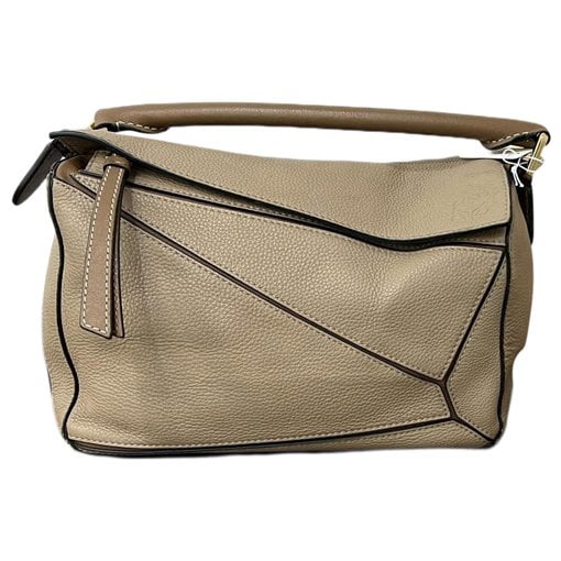 Puzzle leather handbag