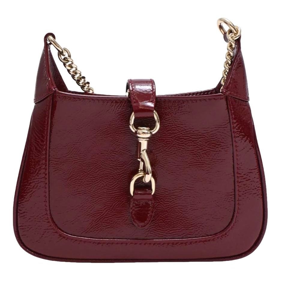 Jackie Notte patent leather crossbody bag