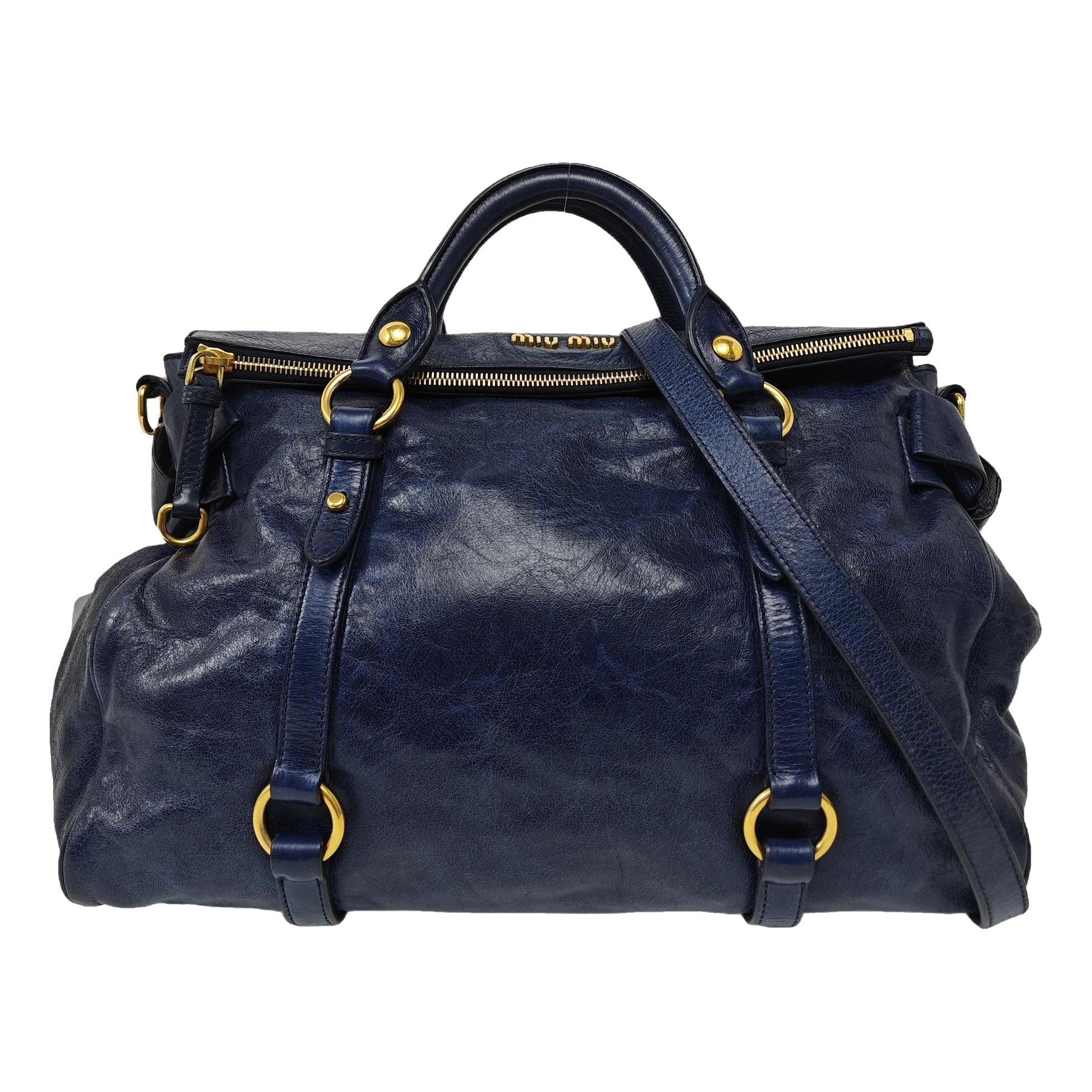 Bow bag leather handbag