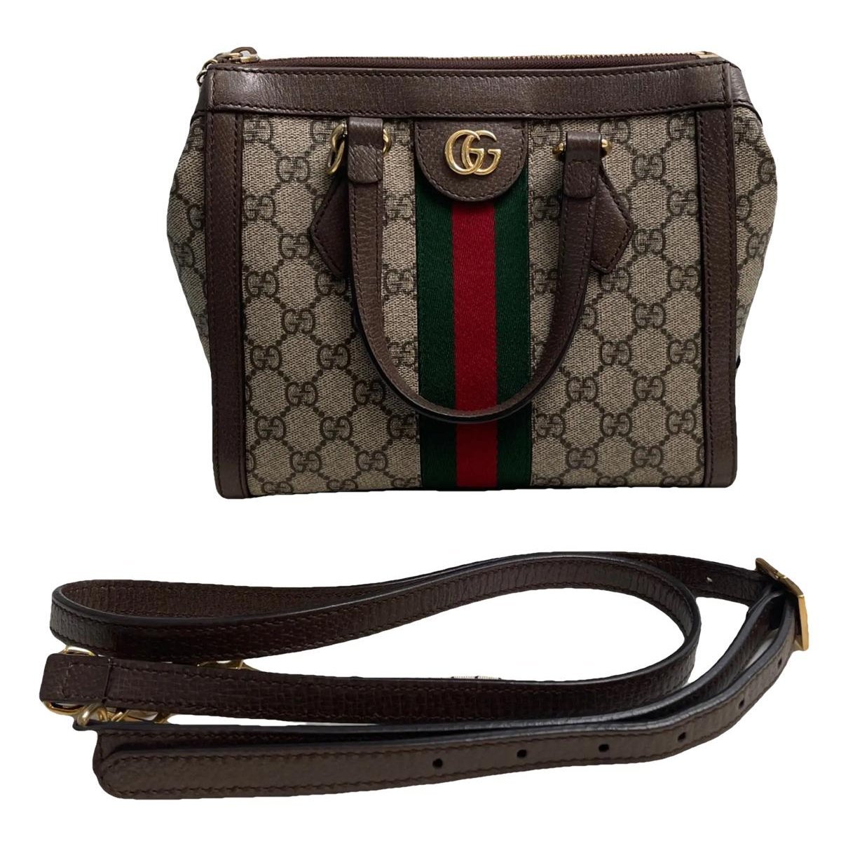 Ophidia Top Handle vinyl crossbody bag