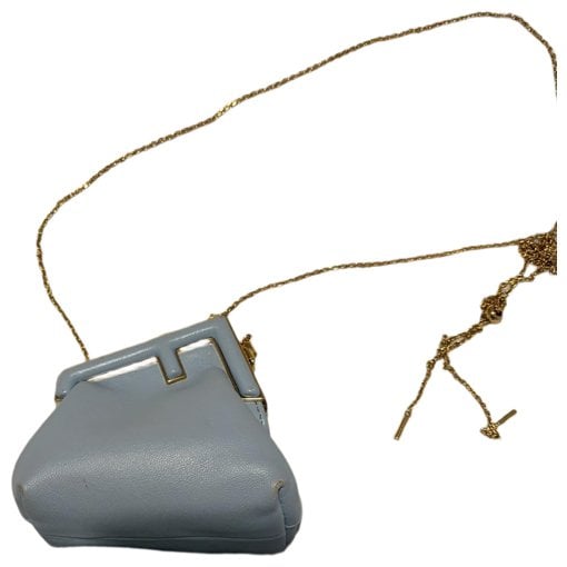 First leather crossbody bag