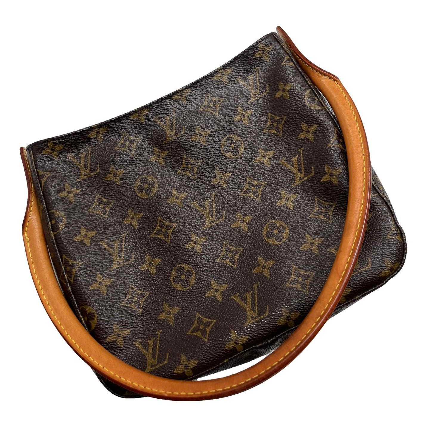 Looping patent leather handbag