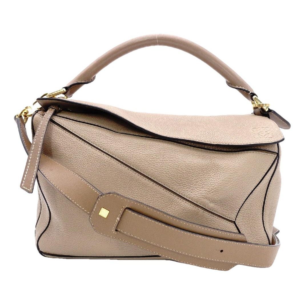 Puzzle leather handbag