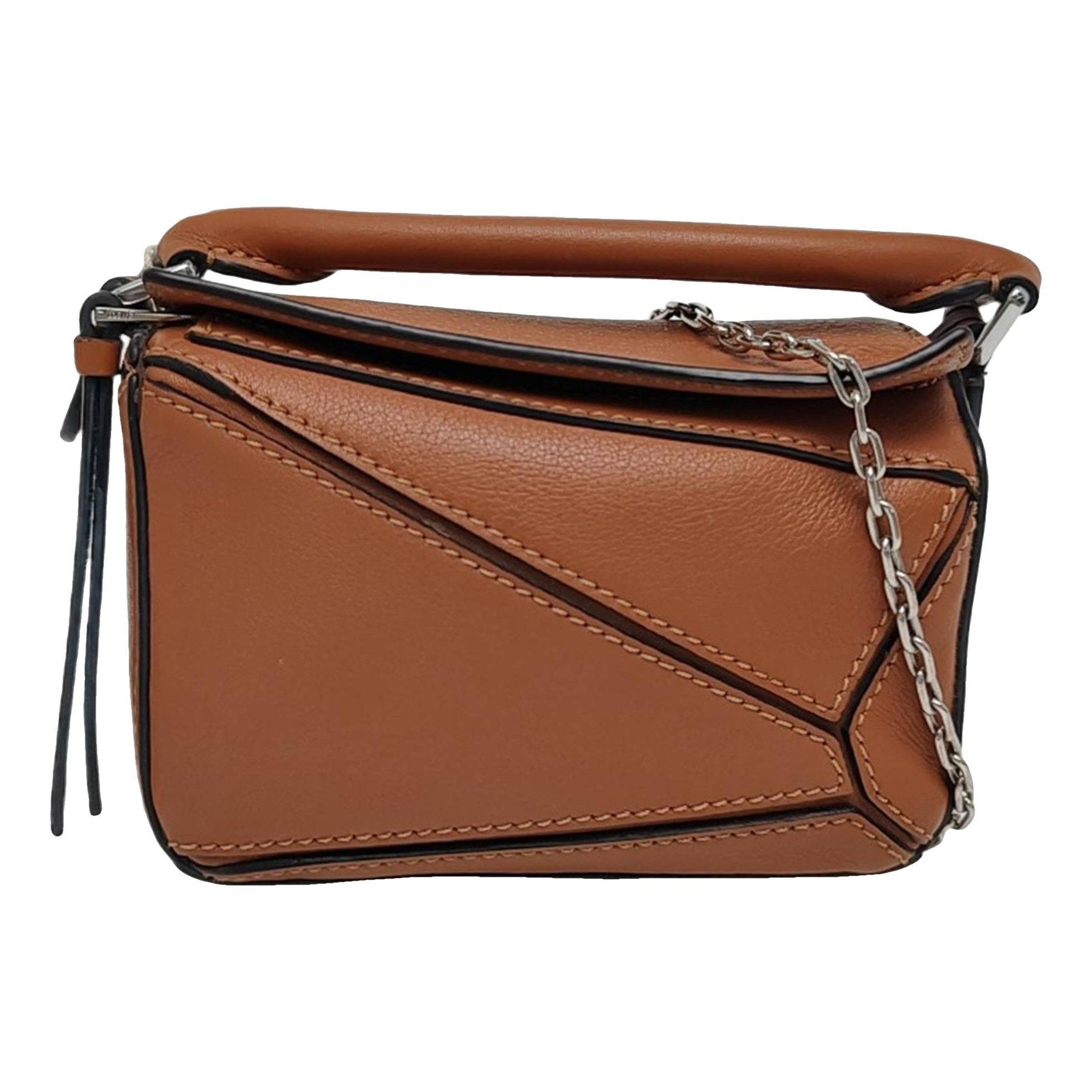 Puzzle leather handbag