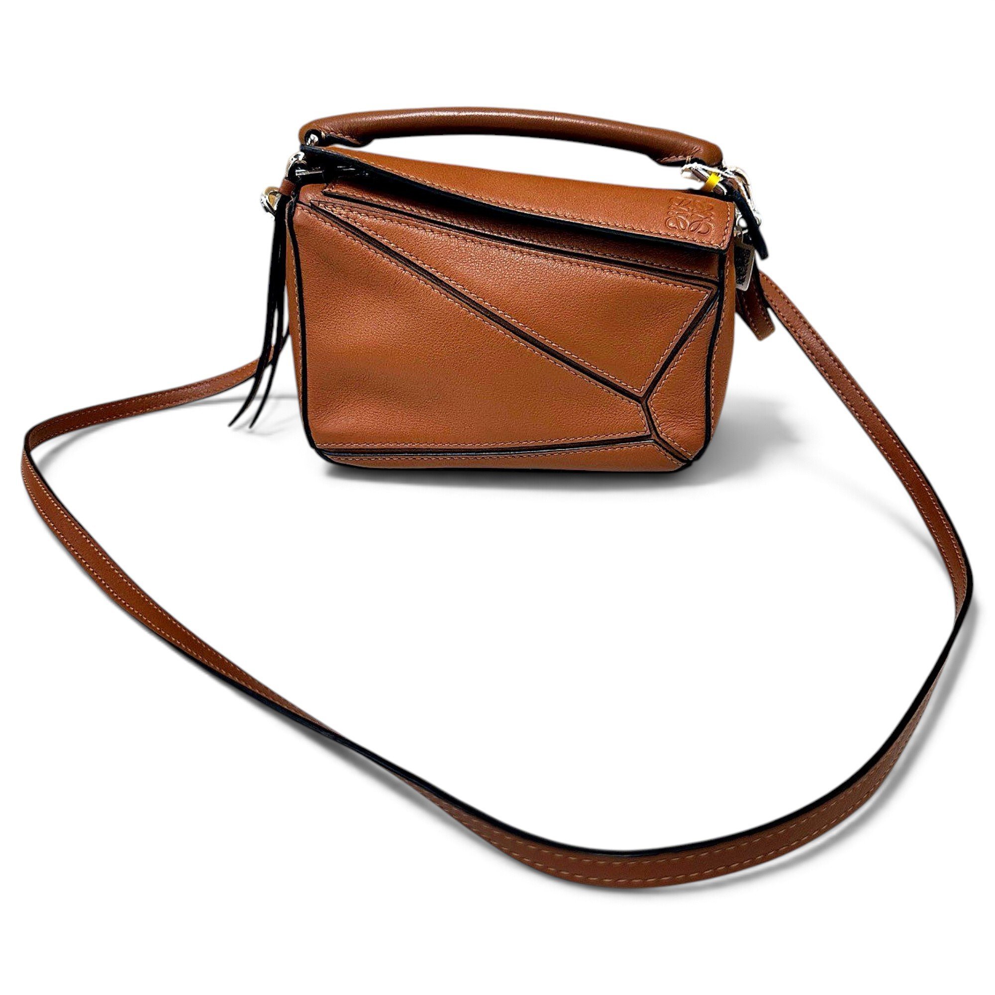 Puzzle leather crossbody bag