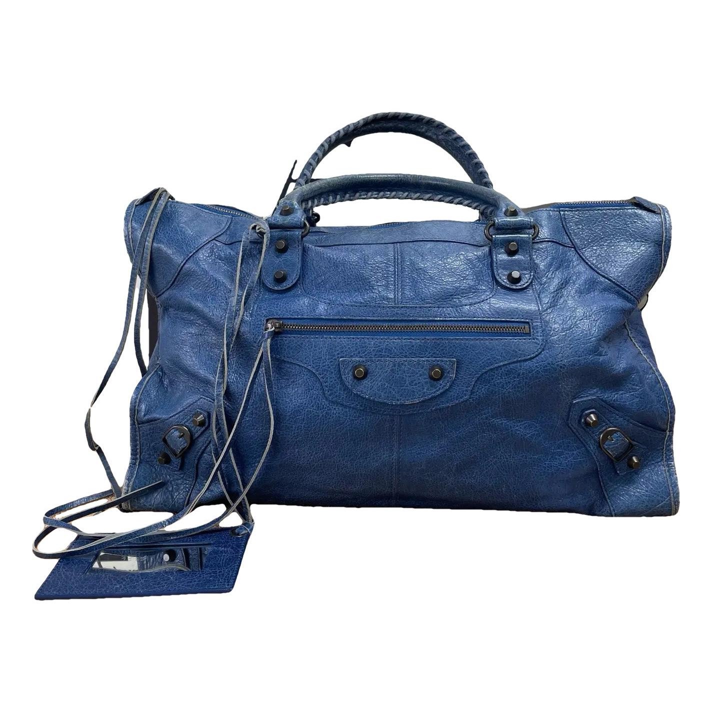 First leather handbag
