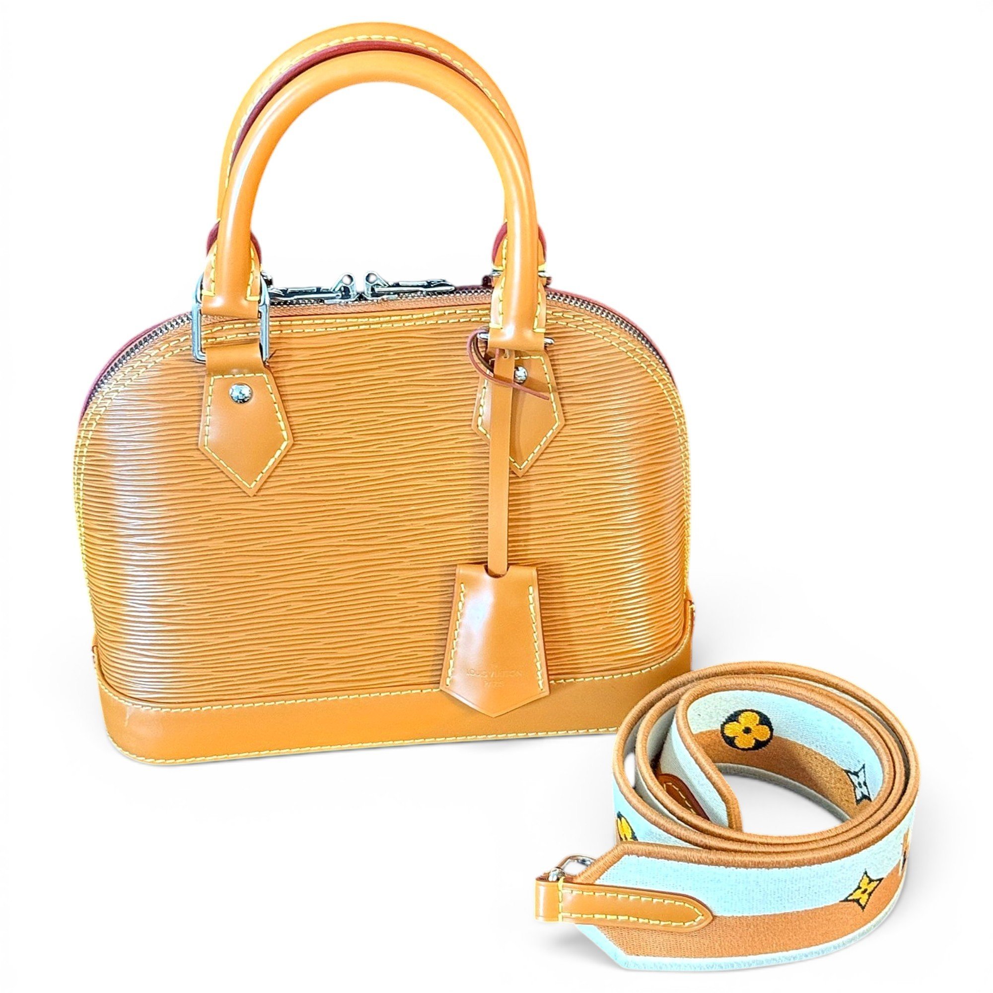 Louis Vuitton Alma leather handbag