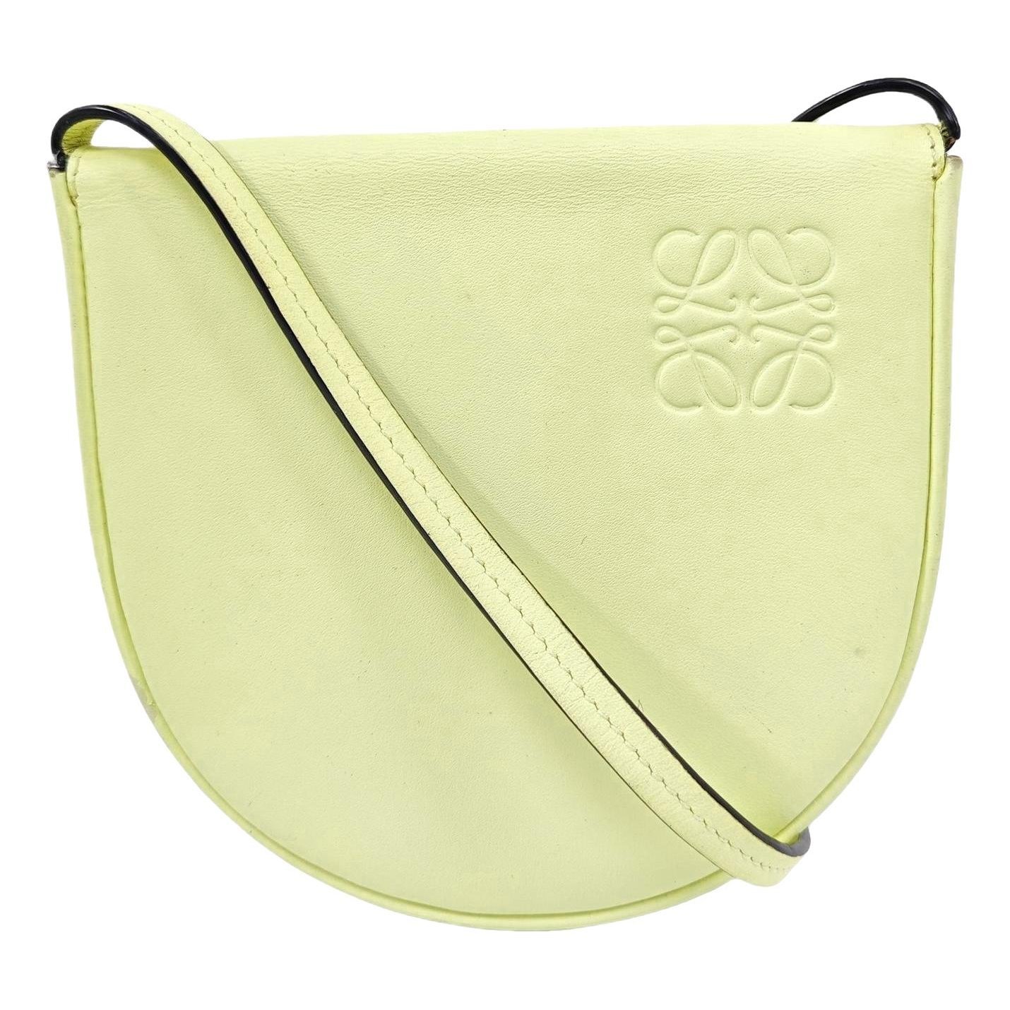Heel leather handbag