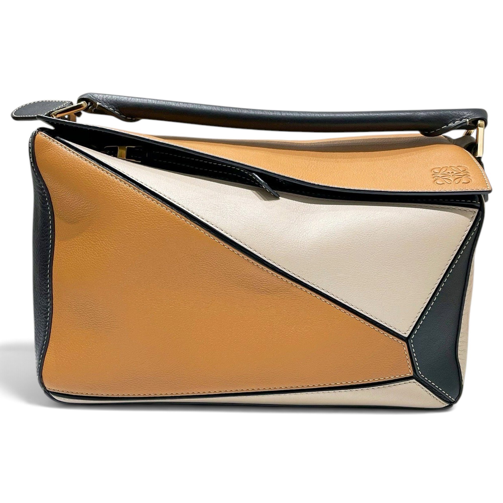 Puzzle leather handbag