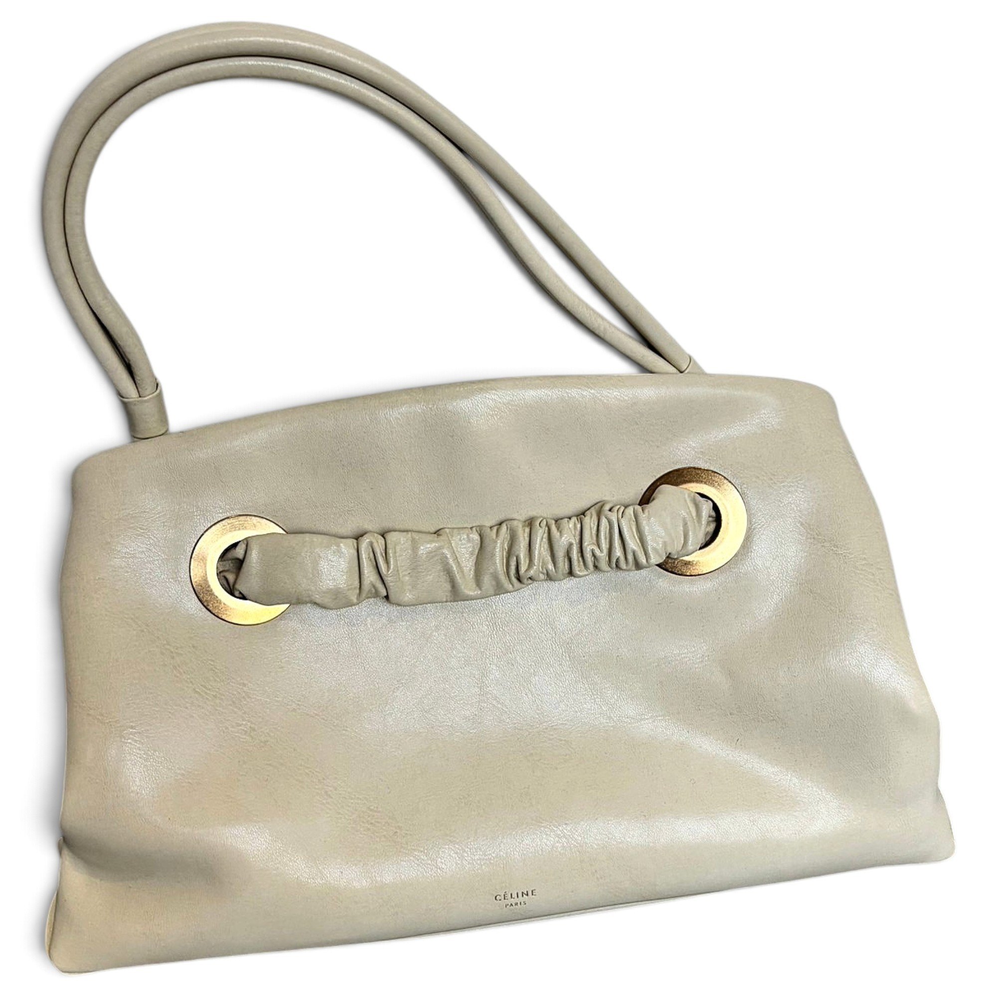 Eyelet leather handbag