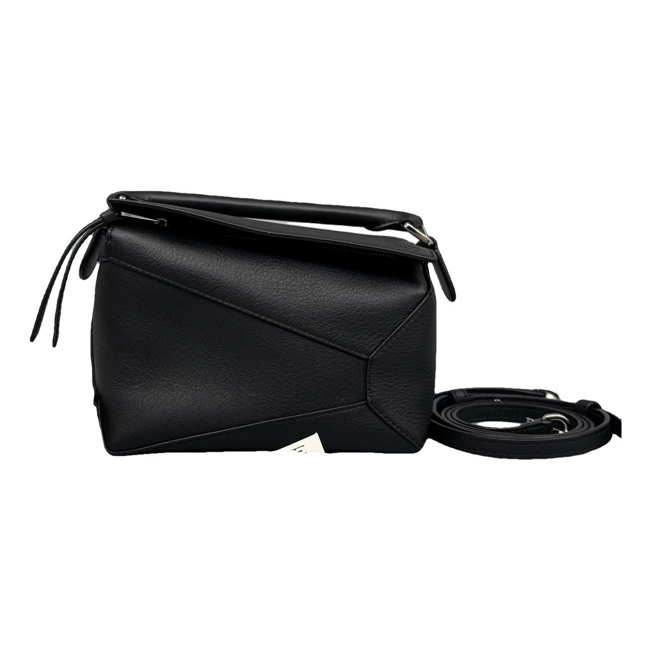 Puzzle leather handbag