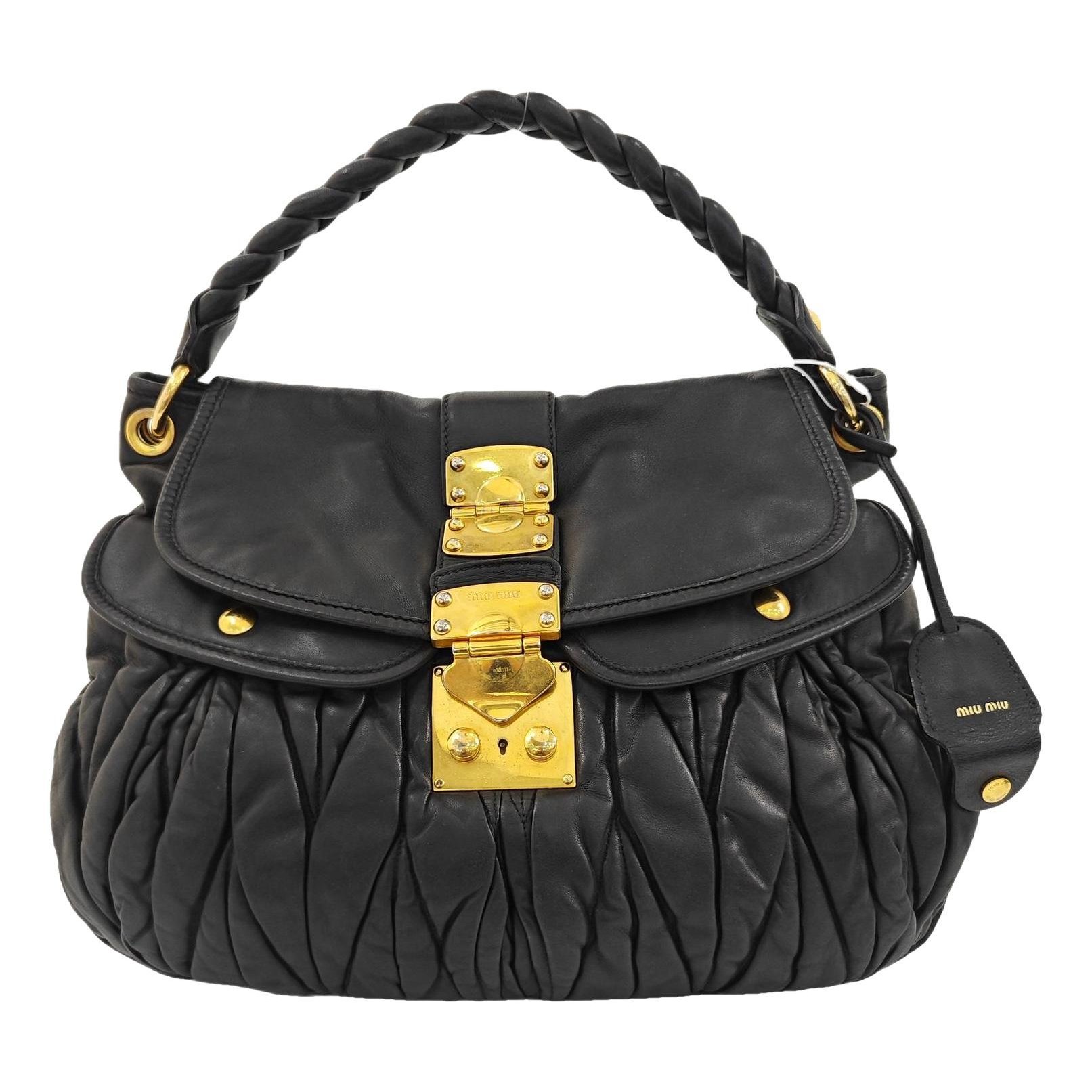 Coffer leather handbag