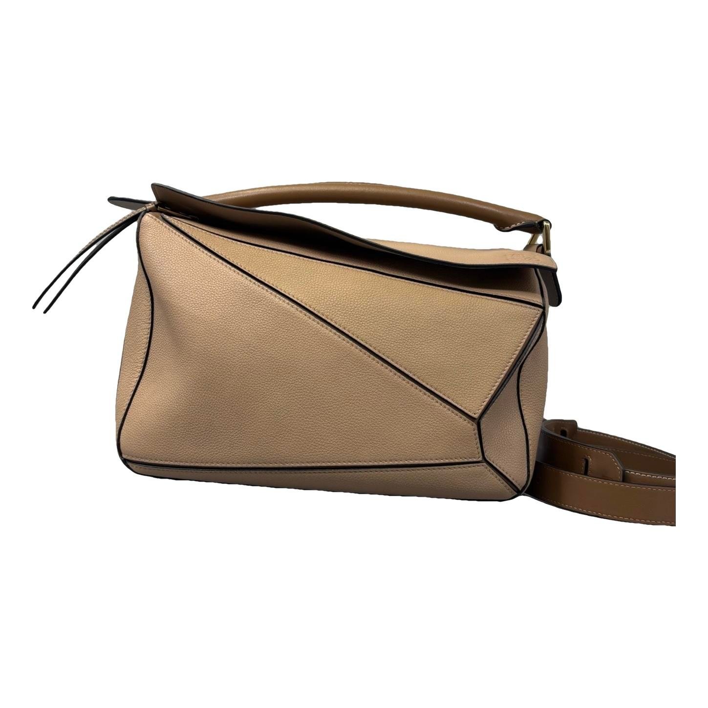 Puzzle leather handbag