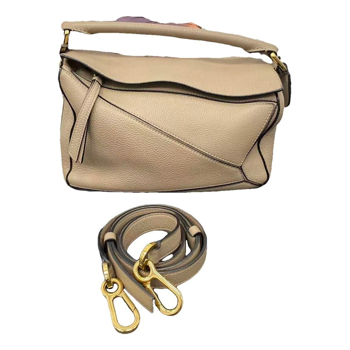 Puzzle leather handbag