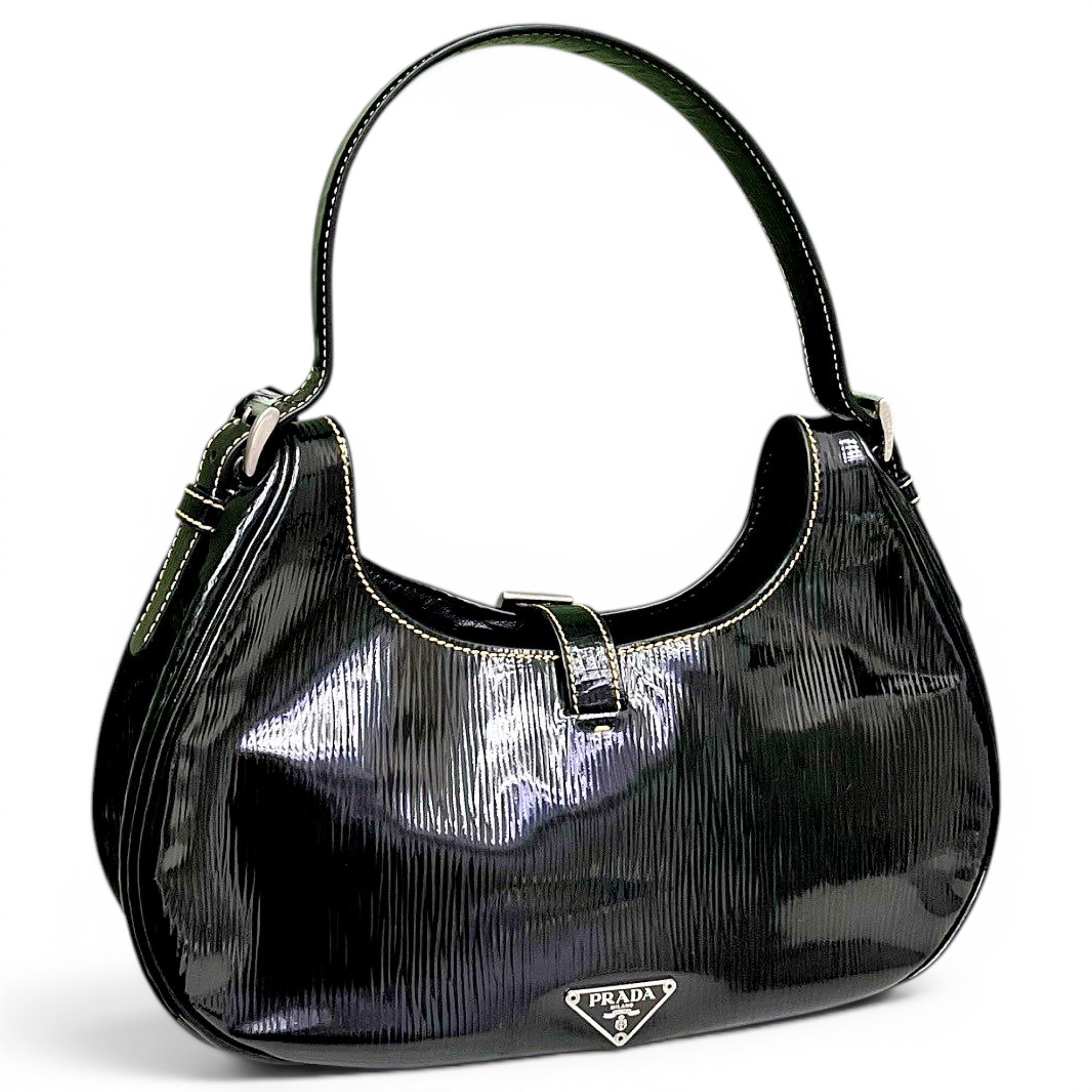 Arqué patent leather handbag