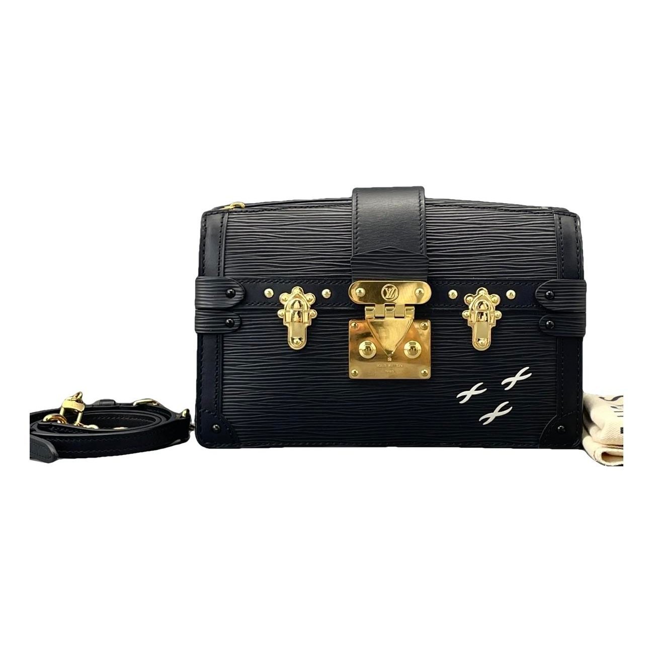 Pochette Trunk leather handbag