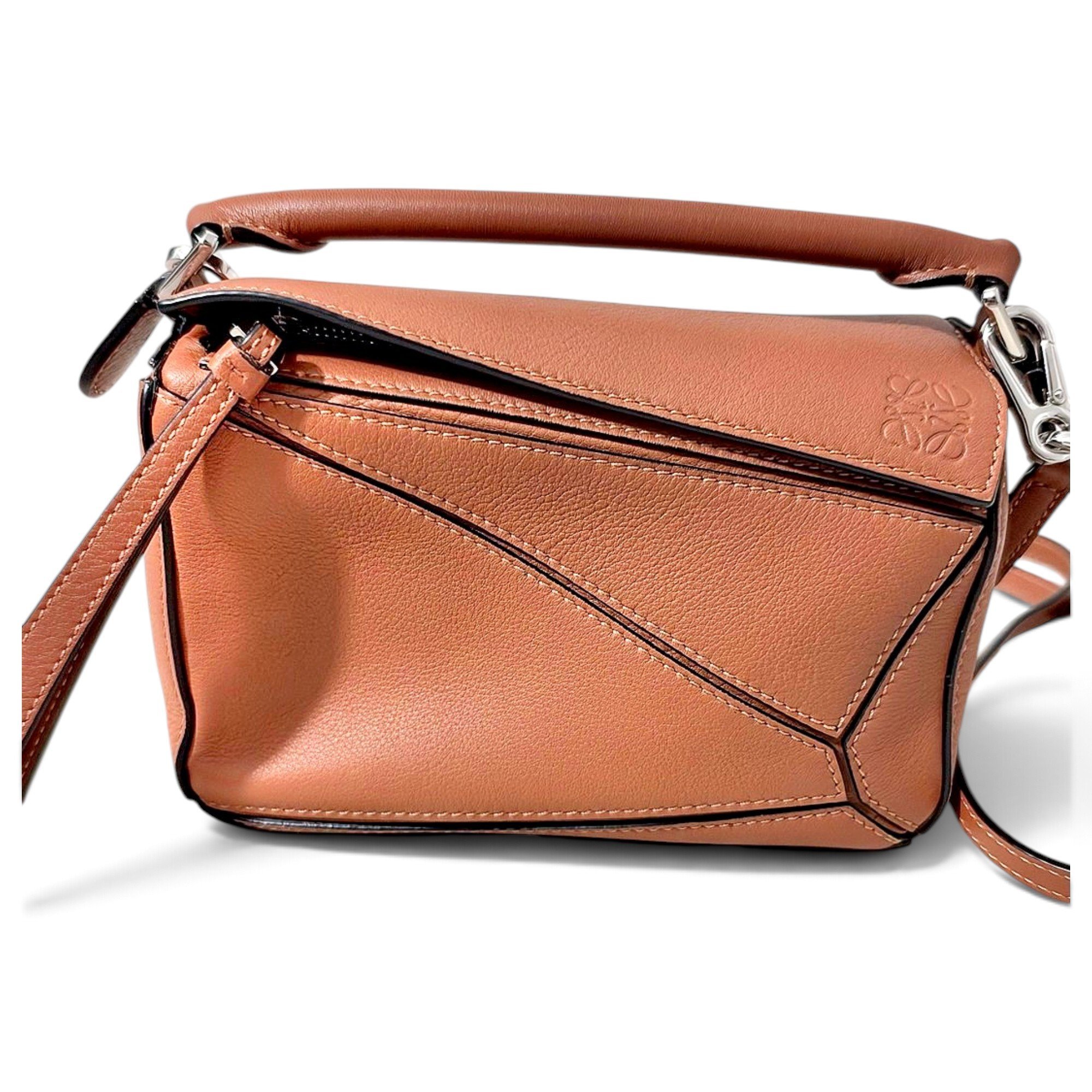 Puzzle leather crossbody bag