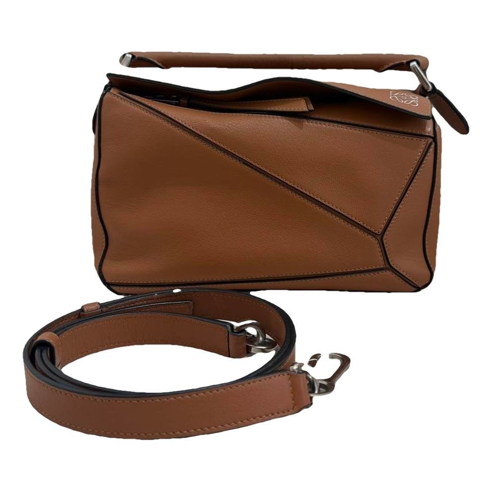 Puzzle leather handbag