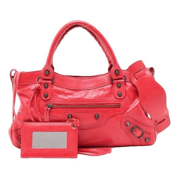 First leather handbag