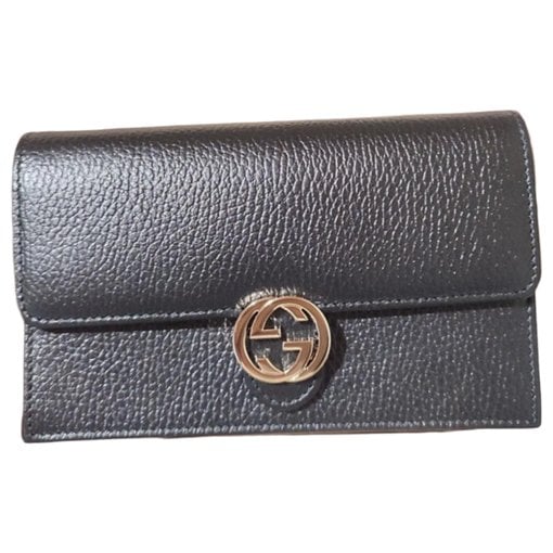 Interlocking leather clutch bag