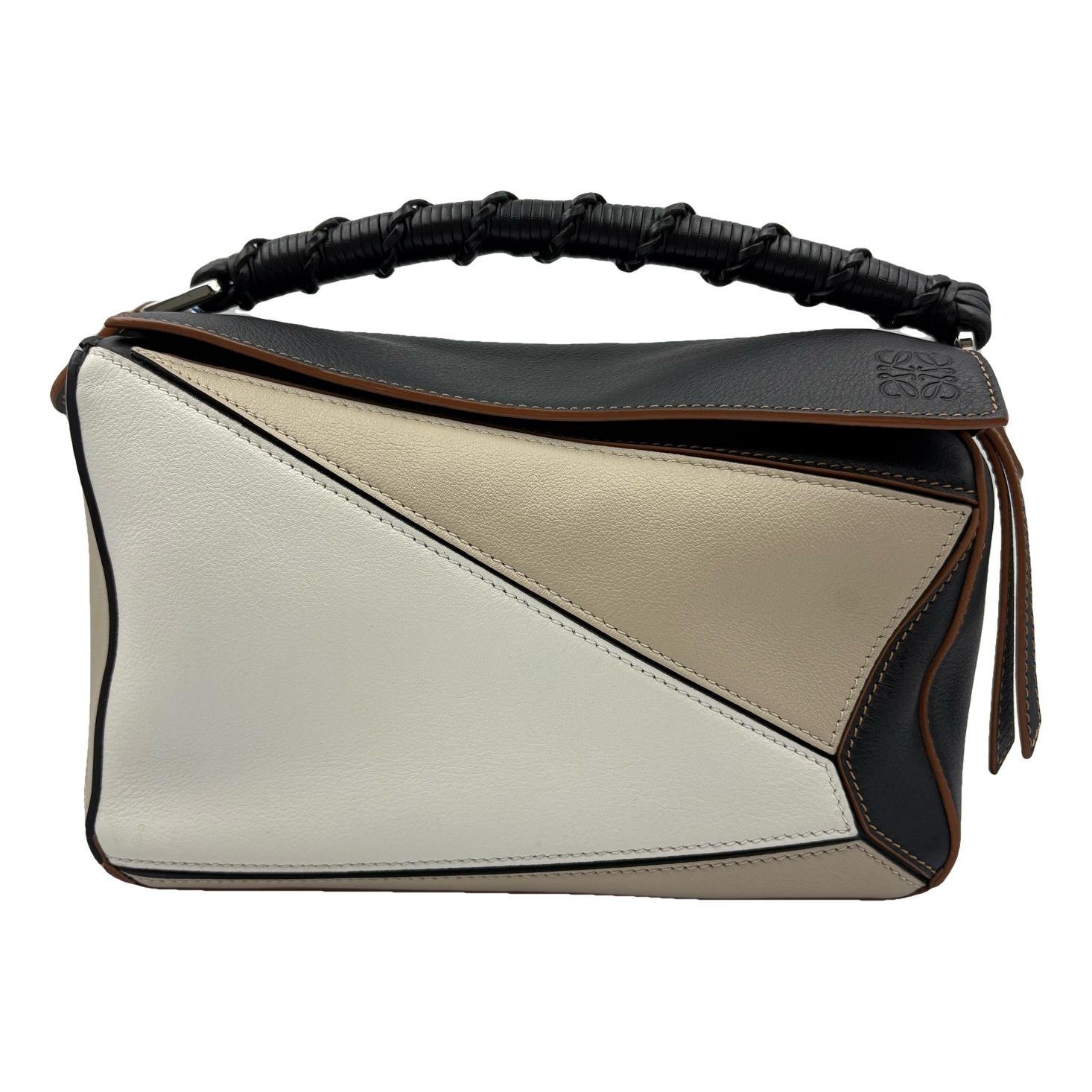 Puzzle leather handbag