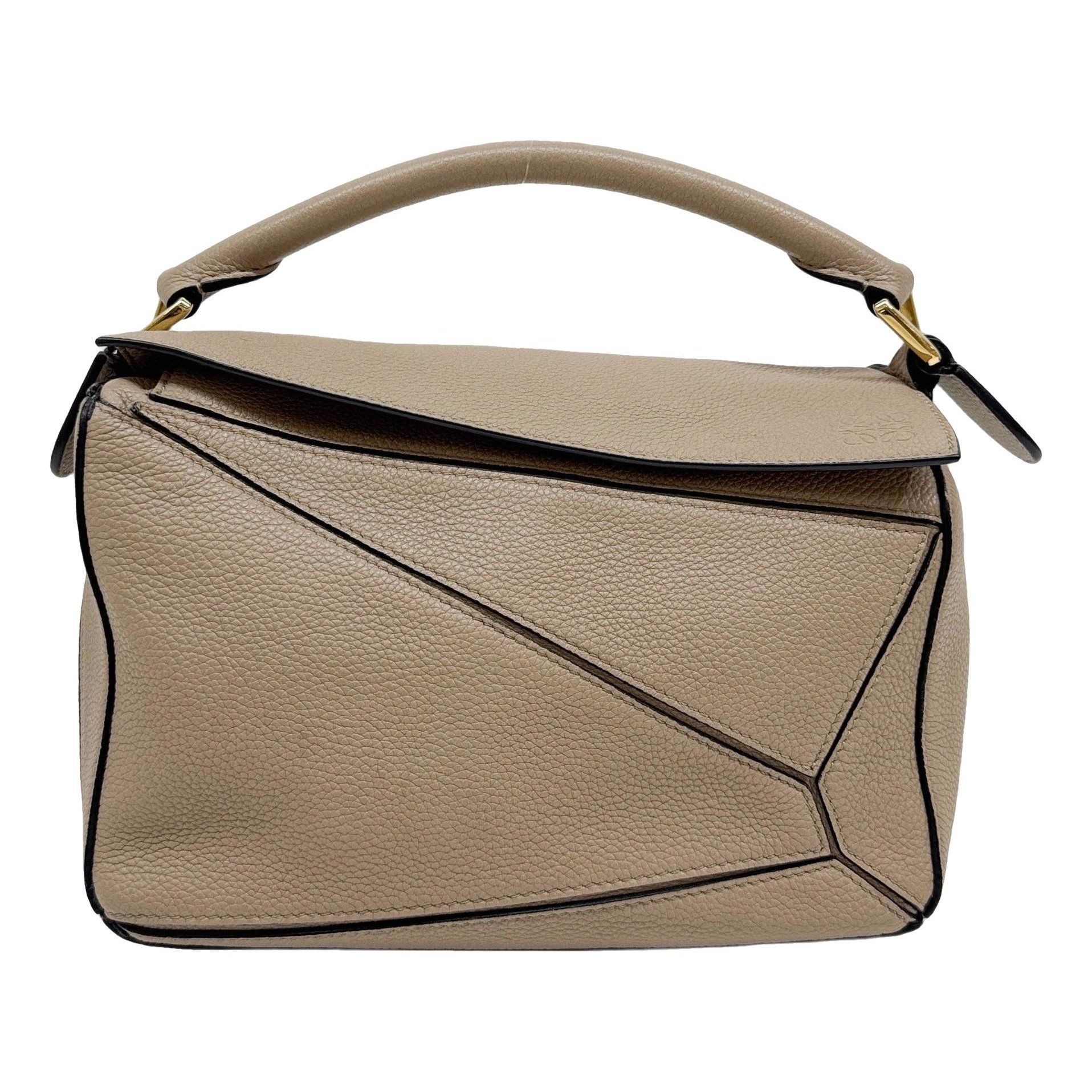 Puzzle leather handbag