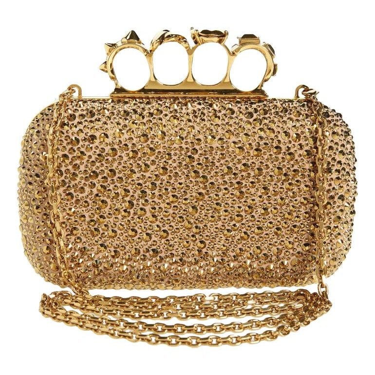 Knuckle leather clutch bag