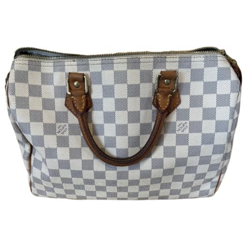 Speedy patent leather handbag