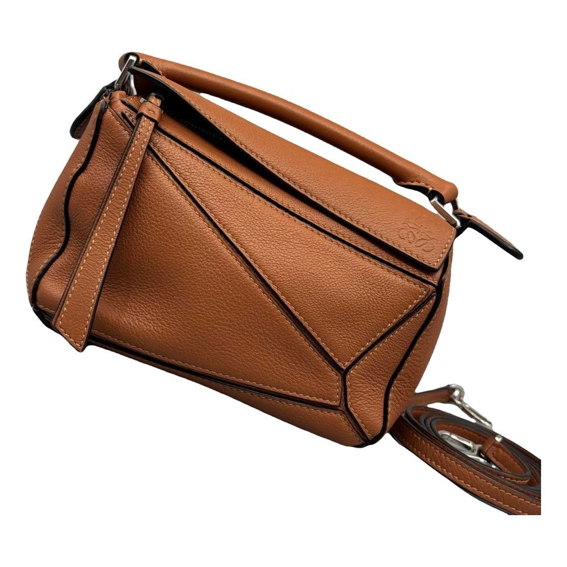 Puzzle leather handbag