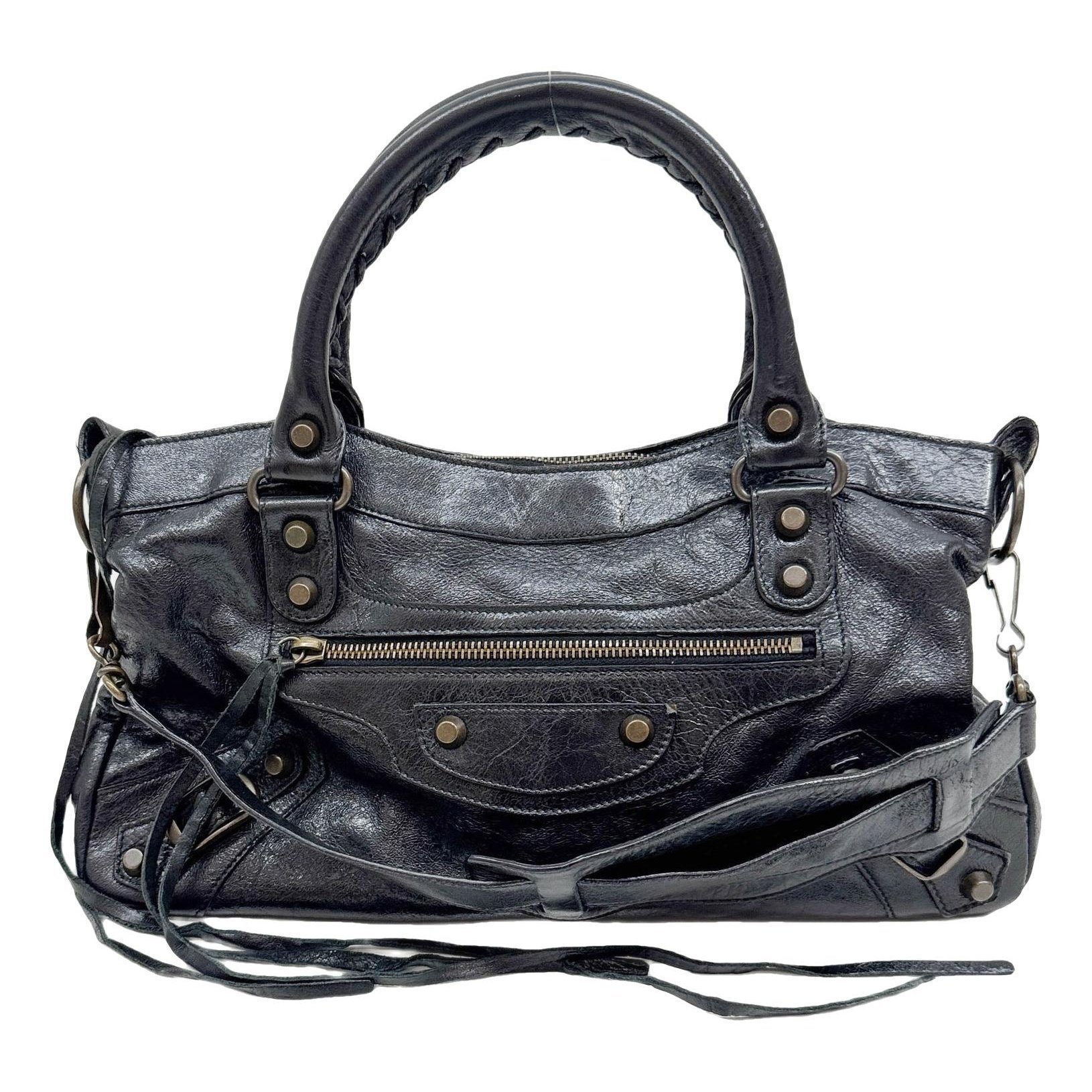 First leather handbag