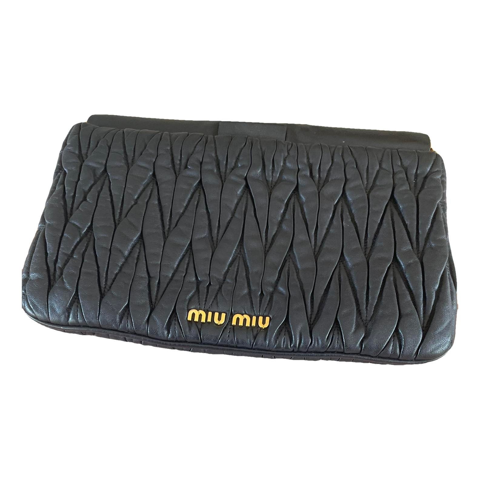 Matelassé leather clutch bag