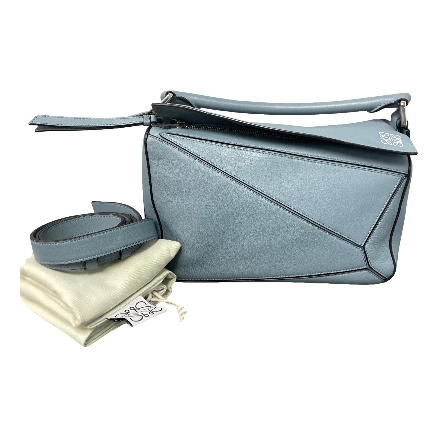 Puzzle leather handbag