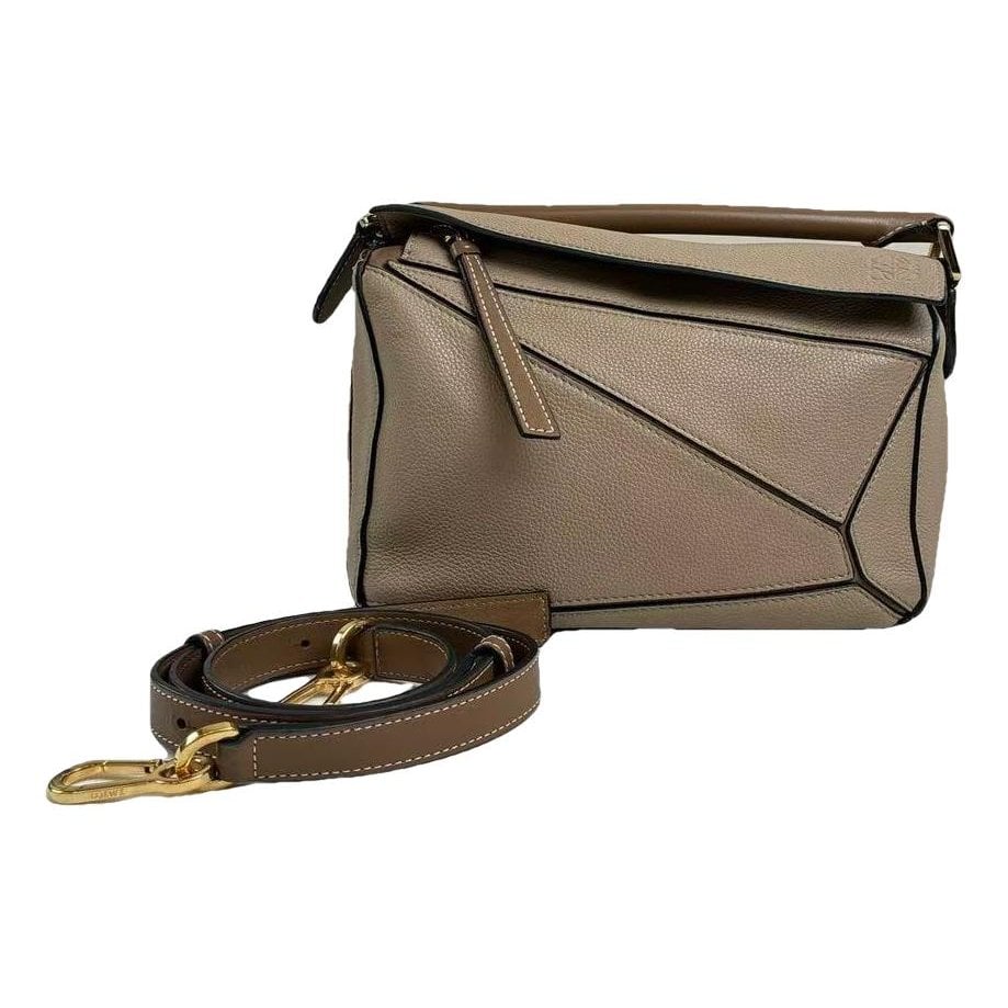 Puzzle leather handbag