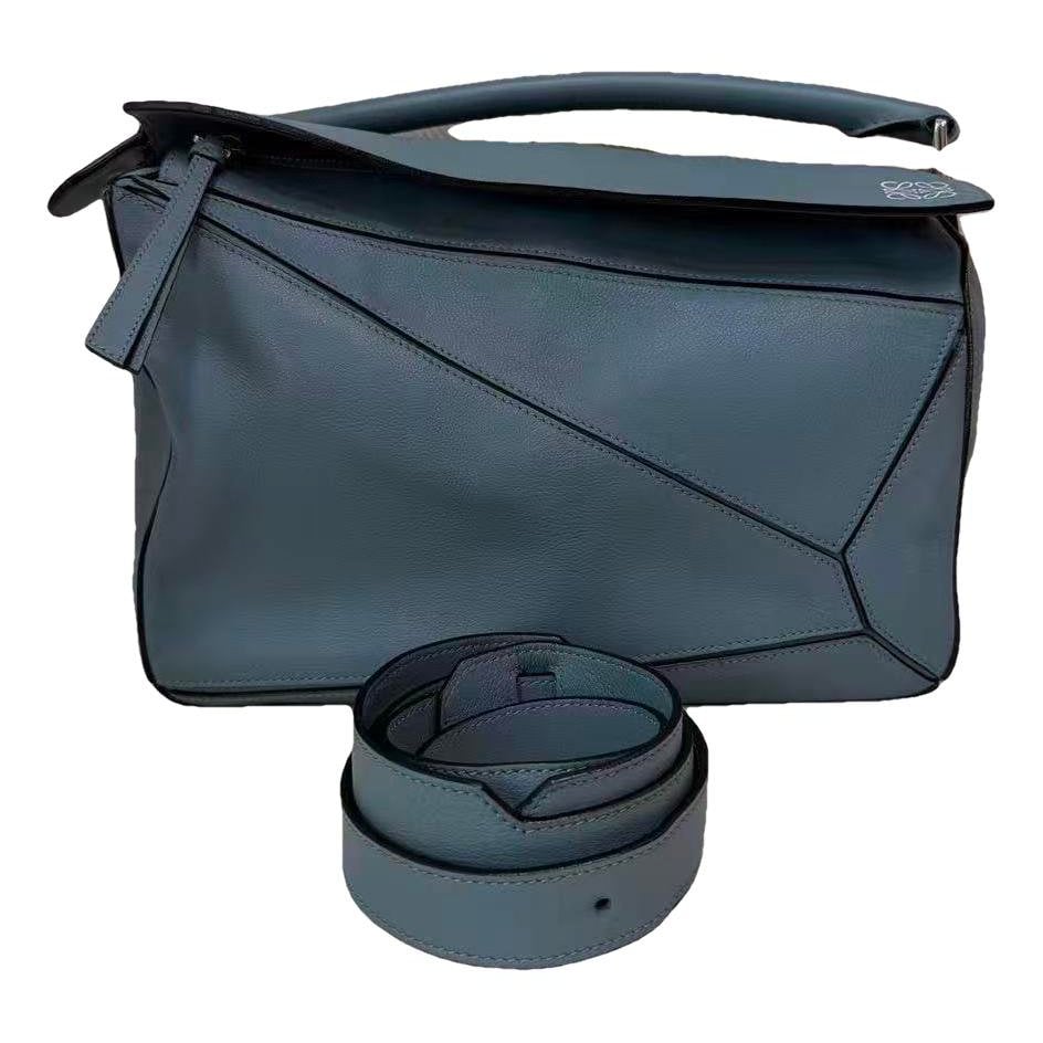 Puzzle leather handbag