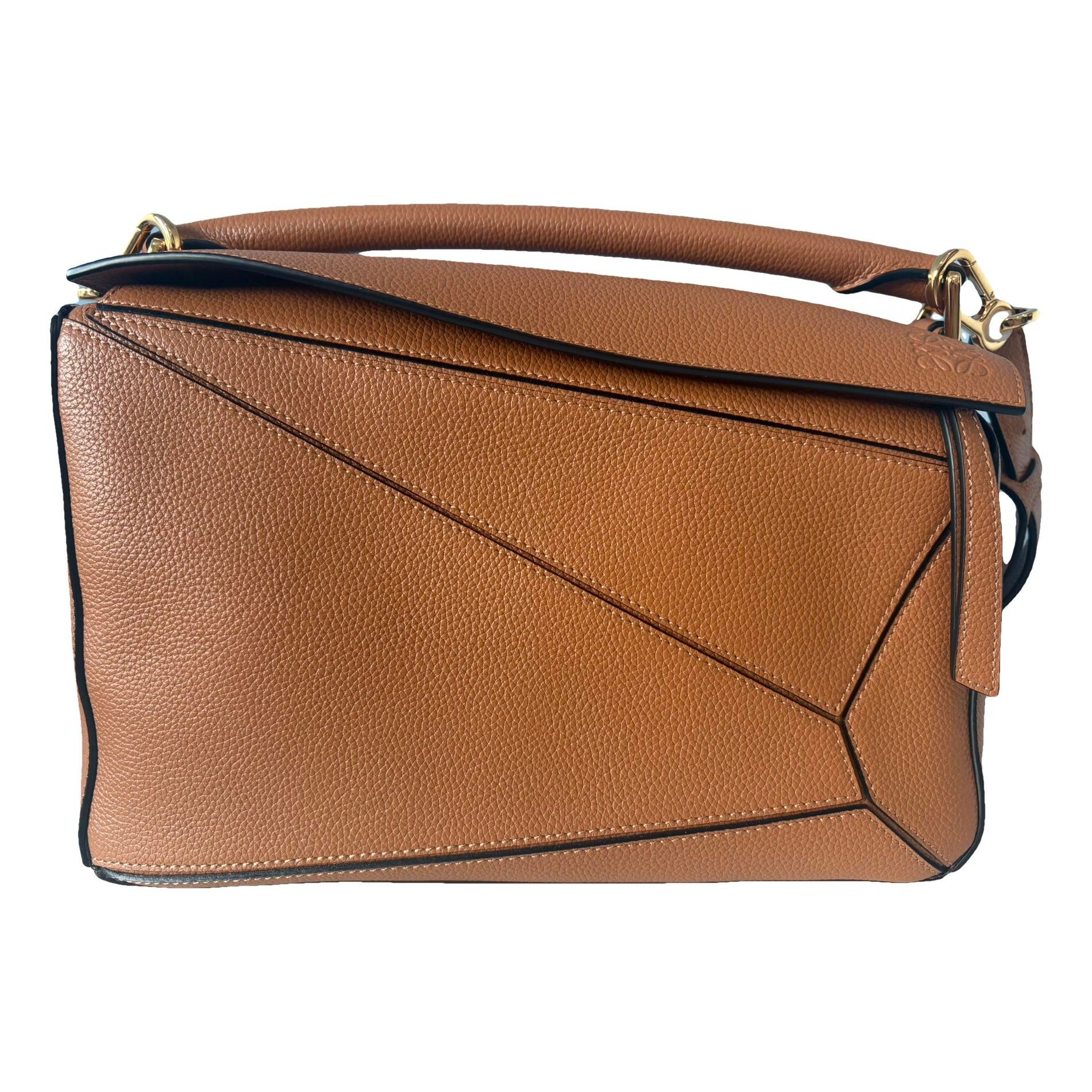 Puzzle leather handbag