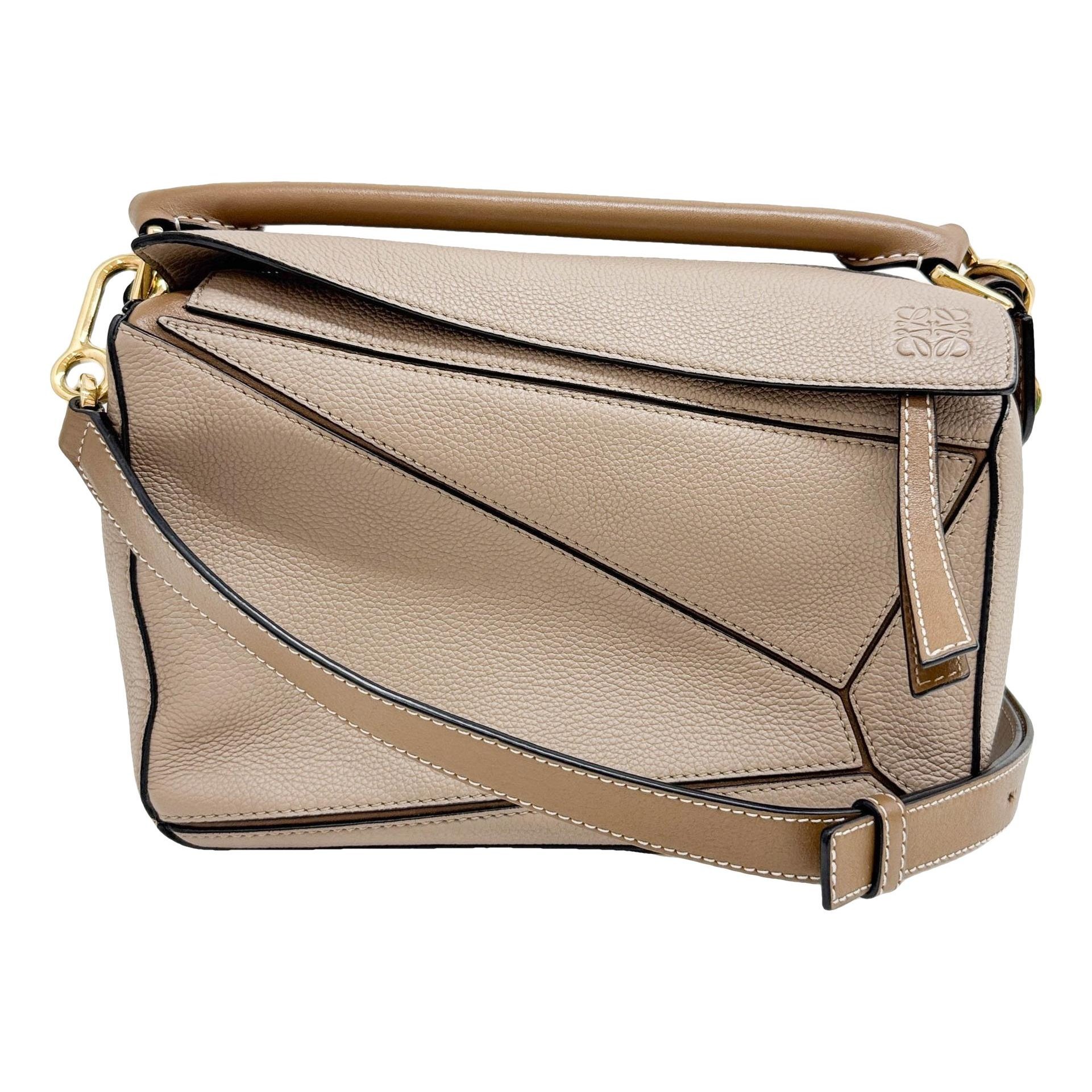 Puzzle leather handbag