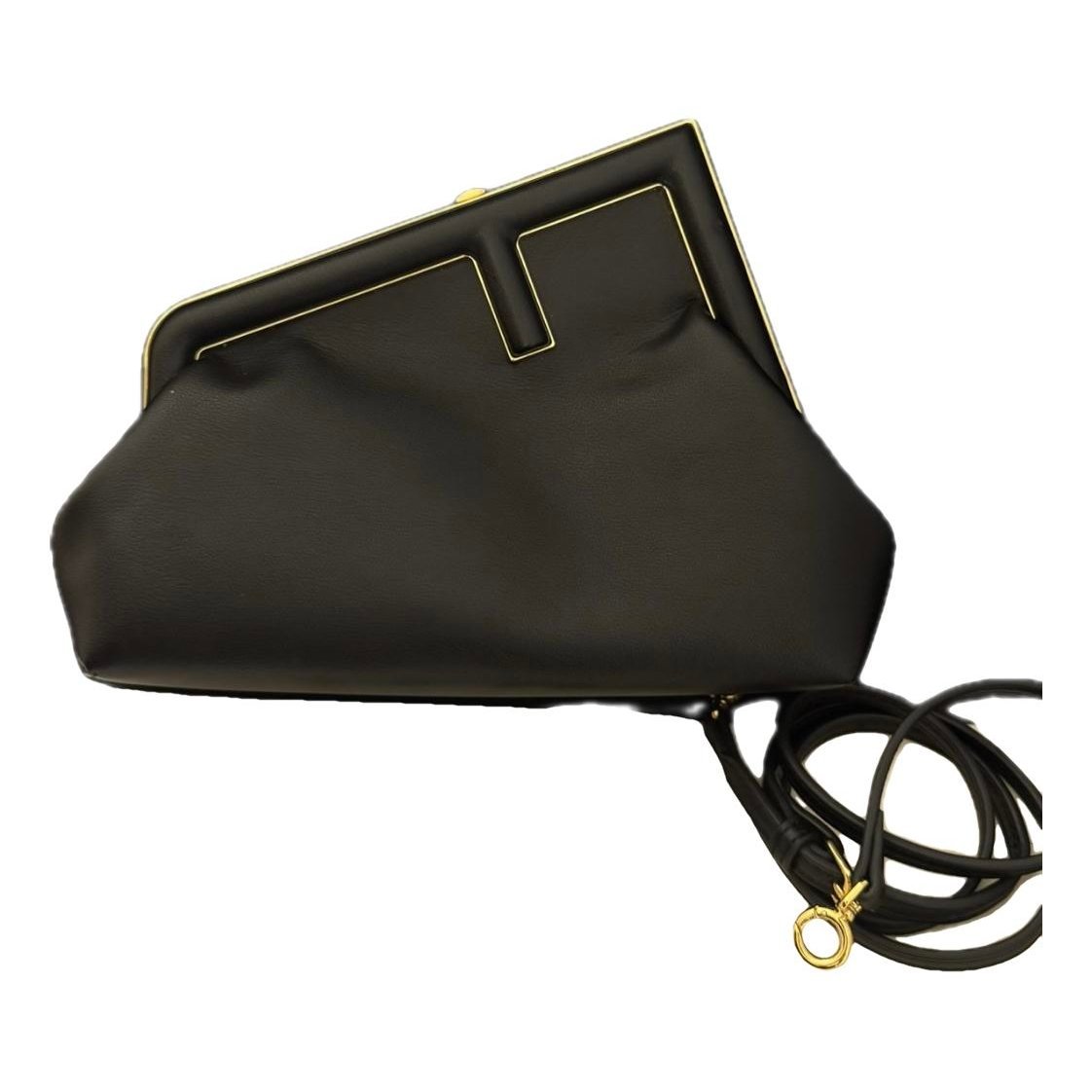 First leather handbag