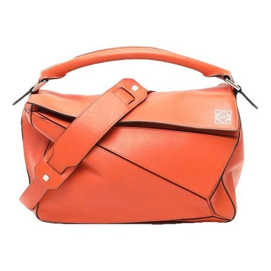 Puzzle leather handbag