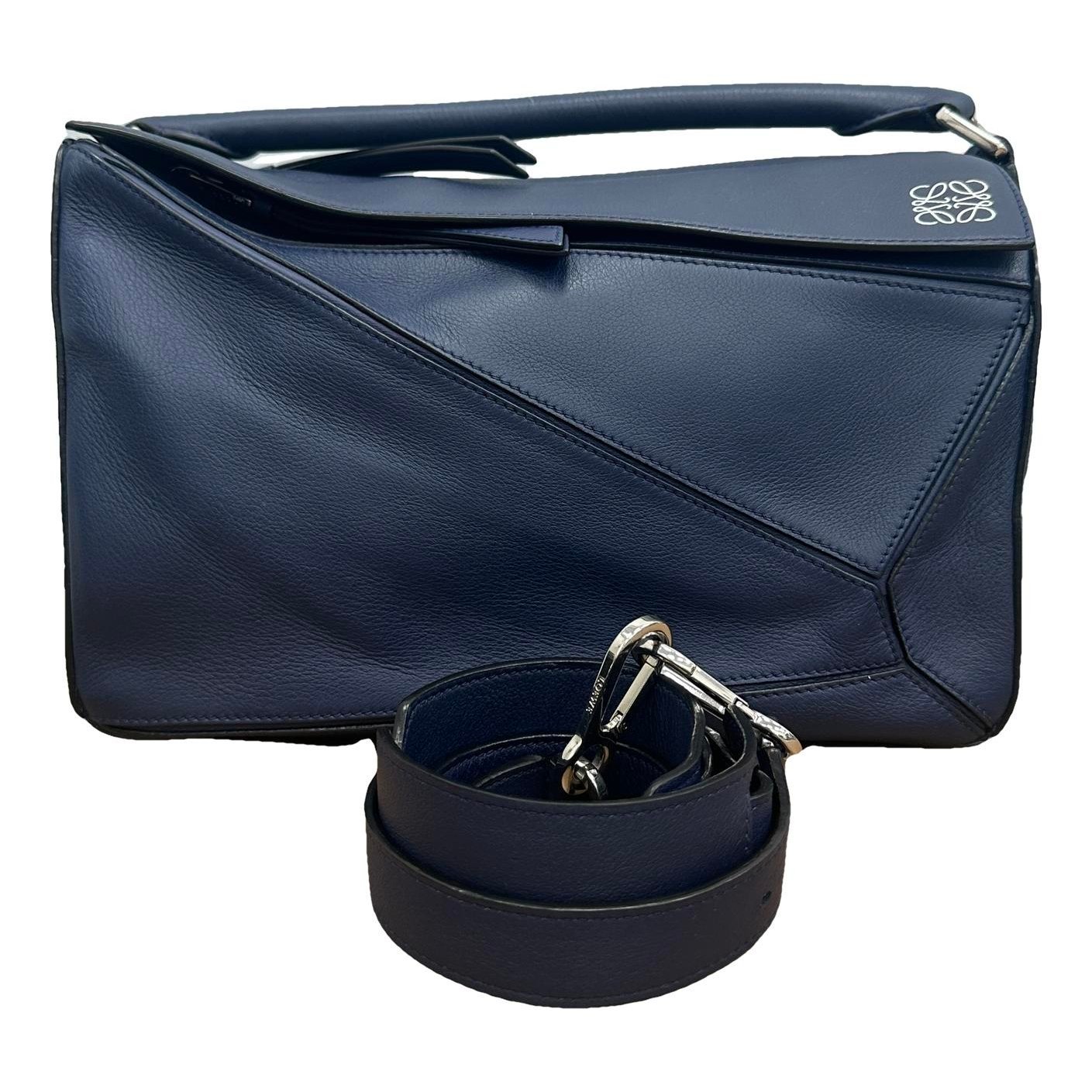 Puzzle leather handbag